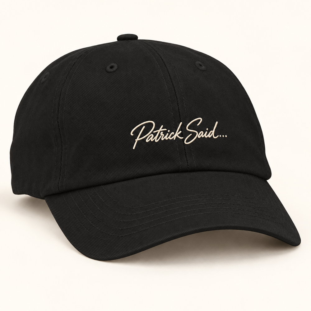 The Off Duty — black cotton dad cap with ivory Patrick Said… embroidery